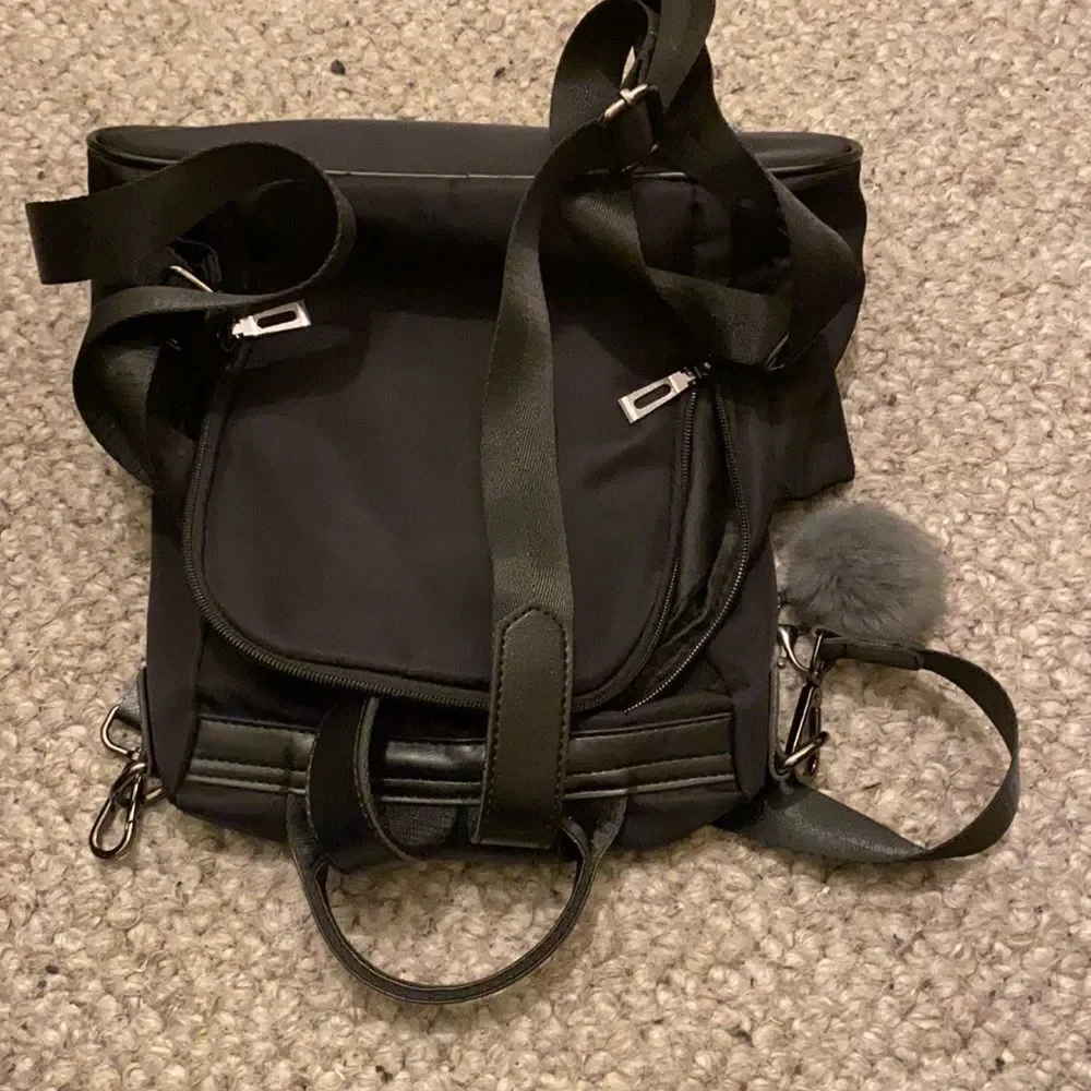 YaLuxe black nylon backpack.